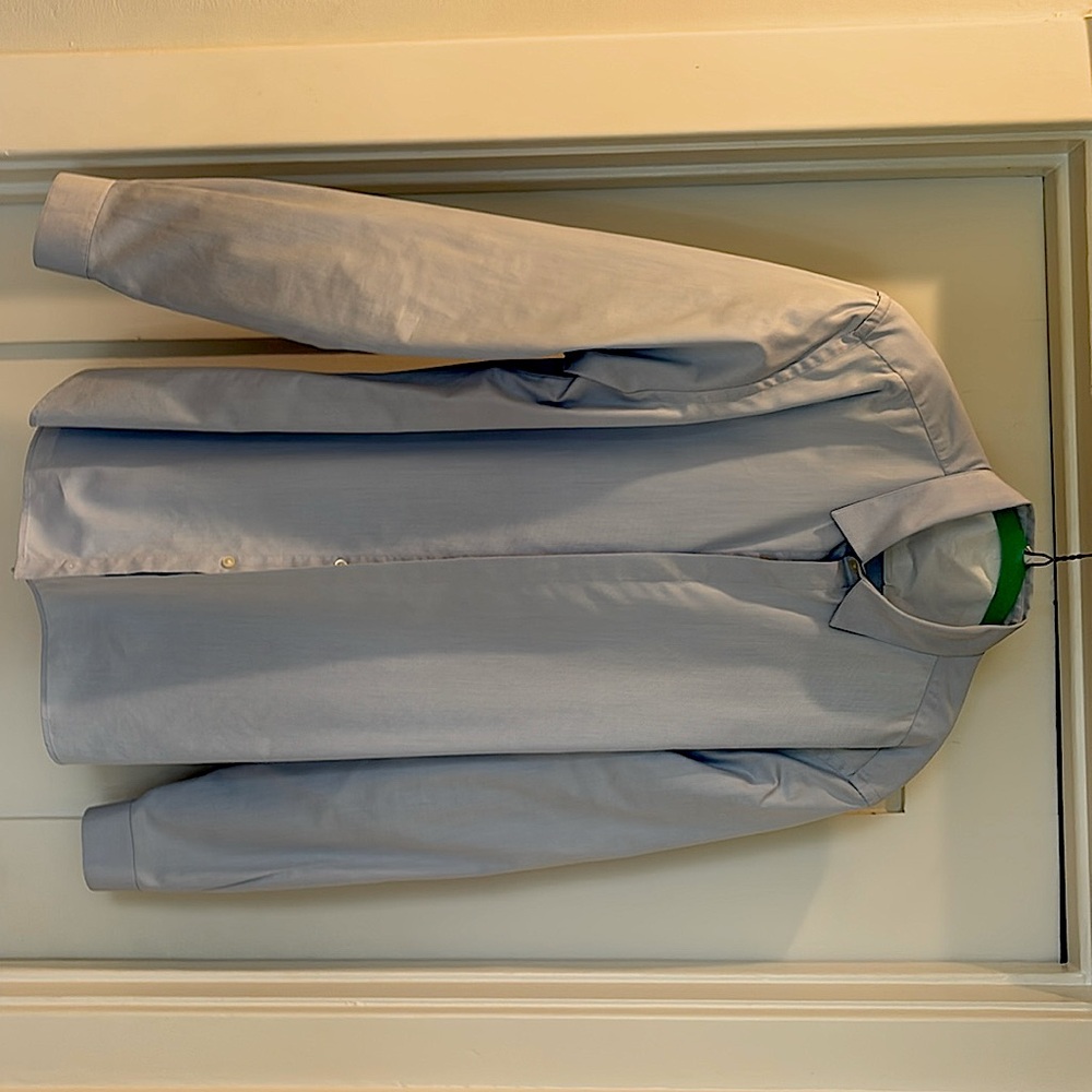 Pale blue cotton shirt.